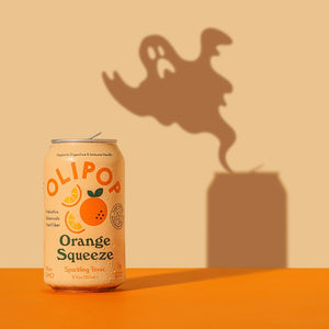 Image of OLIPOP soda cans with ghosts appearing as shadows